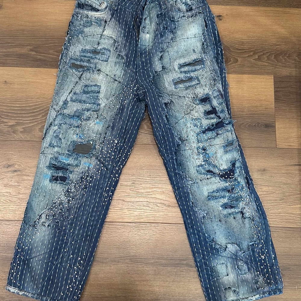 Relaxed Blue Distressed Denim Jeans
